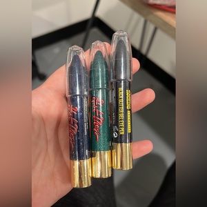 Rocking Cosmetics glitter gel eye pens - black, blue and green.